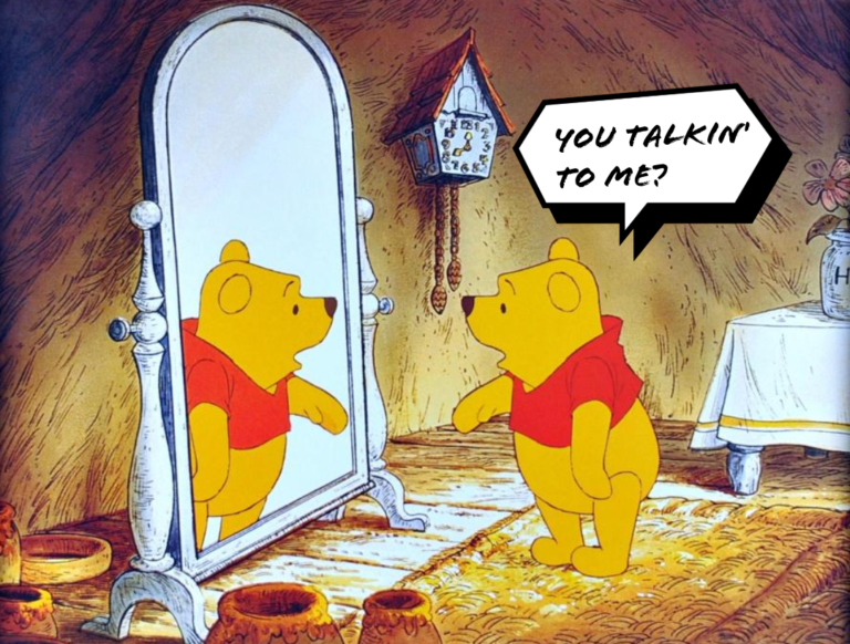 A lonely Winnie the Pooh looking at his reflection