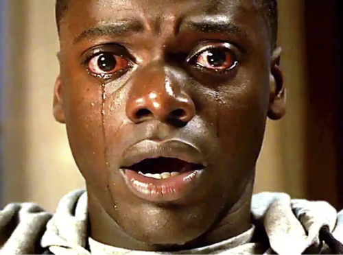 Man from the film Get Out, in shock, crying